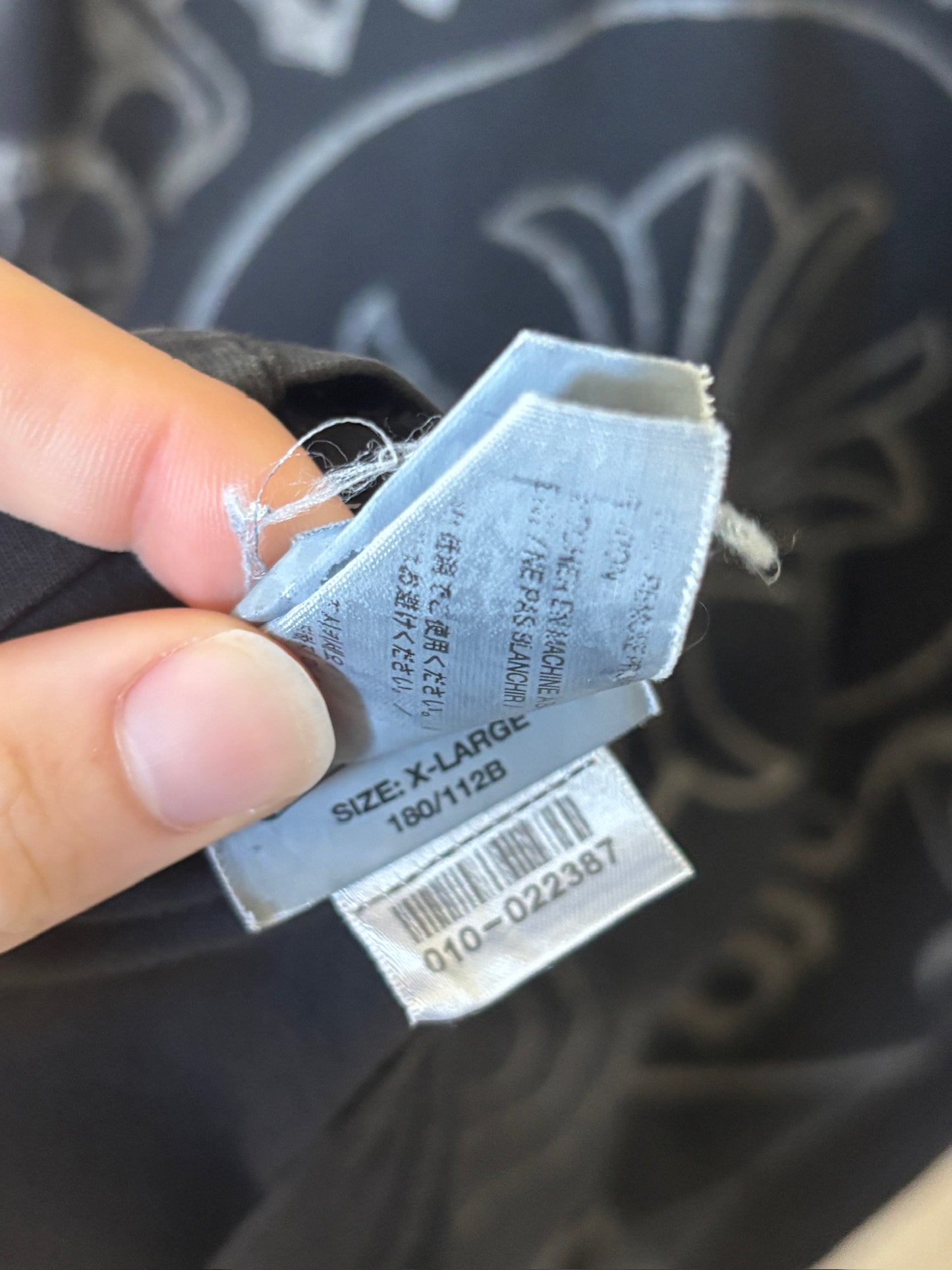 Sun Faded Thin Horseshoe Tee