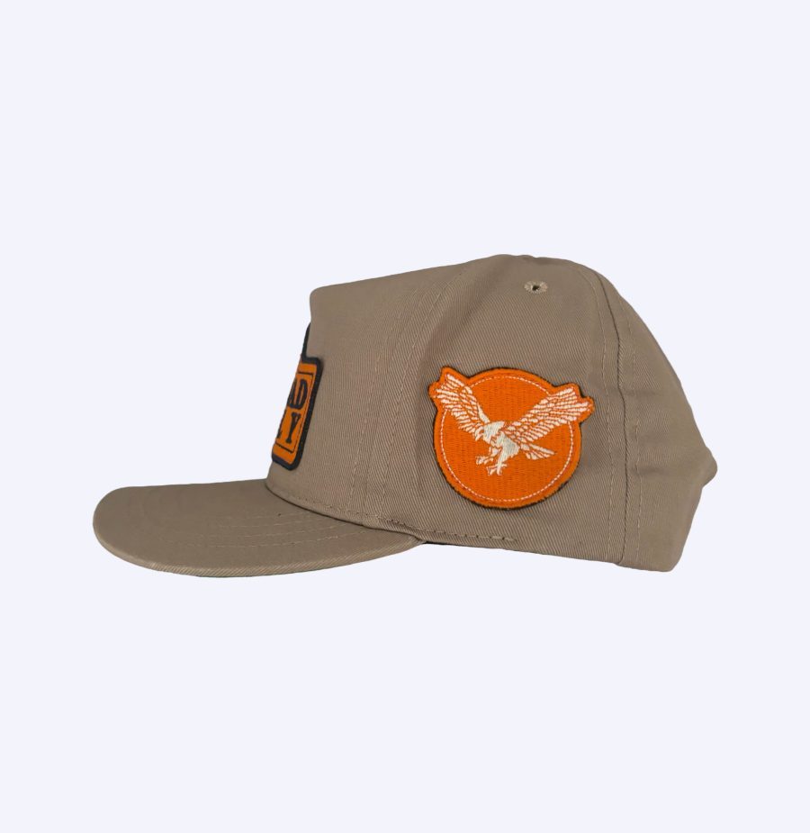 side of beige and orange off road rally hat